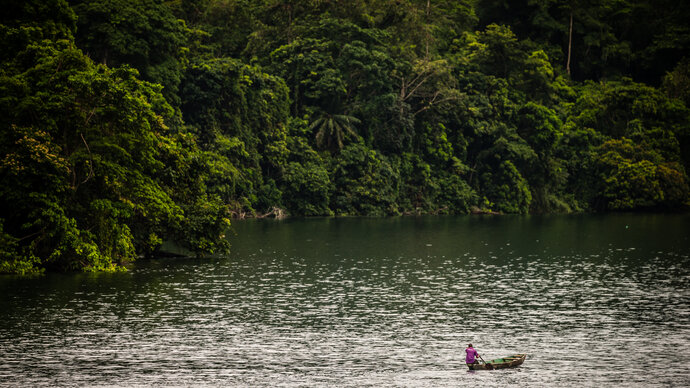 Bank of lake with a fishing canoe