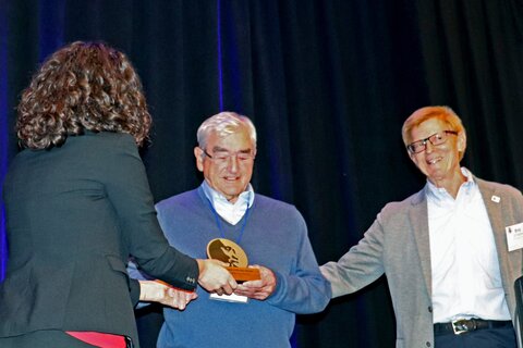 Professor Fenwick receiving the Kyelem Prize. Image copright COR NTD